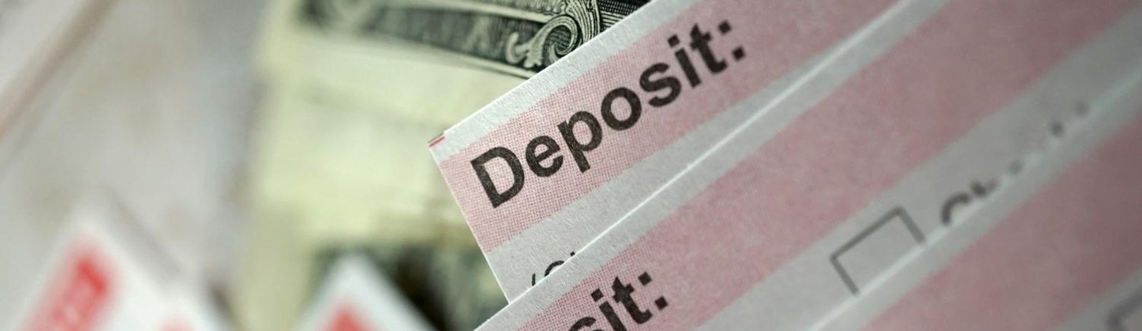 Deposit slip and cash.