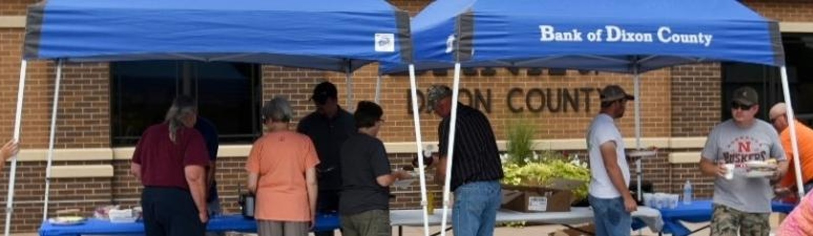 People gathered outside the bank for food and festivities